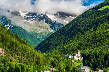 Fototapeta na wymiar Castle of Tures and peaks of Selva dei Molini. Dream South Tyrol. Roma refuge. Italy.