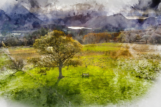 Digitally created watercolor painting of Beautiful Autumn Fall landscape image of view from Low Fell in Lake District looking towards Crummock Water and Mellbreak and Grasmoor peaks