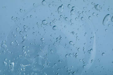 Sample of transparent cosmetic gel as background, closeup