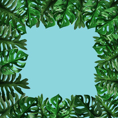 Exotic tropical jungle floral frame with monstera leaves and place for text on blue background