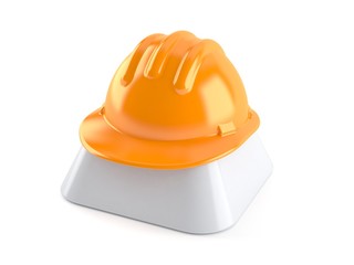 Fototapeta premium Hardhat on computer key