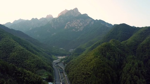 Aerial perspective of one of China's most popular mountains - Mount Huangshan (yellow mountain) at dusk