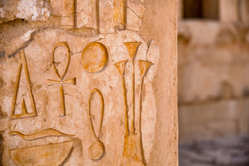 Egyptian hieroglyphs at the Mortuary Temple of Hatshepsut in Luxor, Egypt