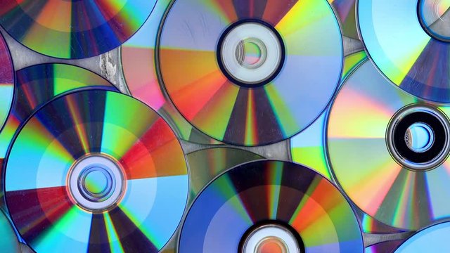 Compact Disc. Going over a  Pile of Archived CD cassettes.