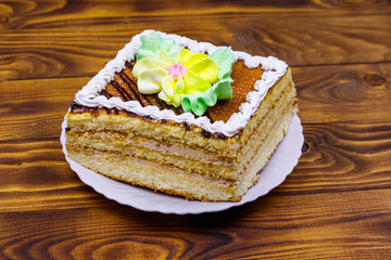 Tasty sweet cake on a wooden table