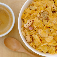 cereal in a white bowl on wooden background. Healthy breakfast concept.