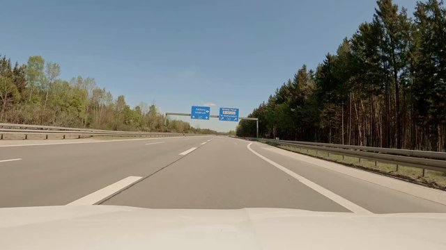 Timelapse of a front car camera filmed the curvy change from one german highway to another.