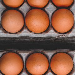 Close-up view of raw chicken eggs on wooden background © ric