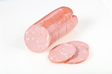 Tasty meat sausages over white background