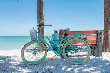 Bike and bench at the beach