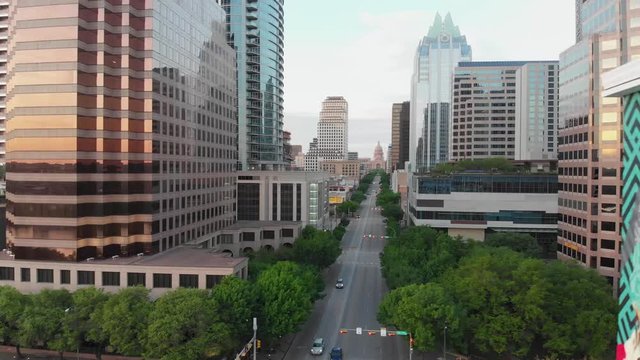 Side Pan of the Captiol Building in Austin TX, Panning to the right revealing congress st. During the Covid-19 Pandemic.