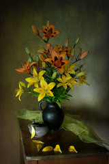 A beautiful bouquet of yellow lilies in a vase