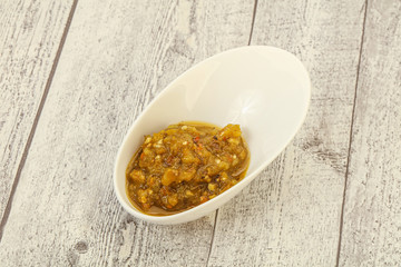 Green spicy sauce in the bowl