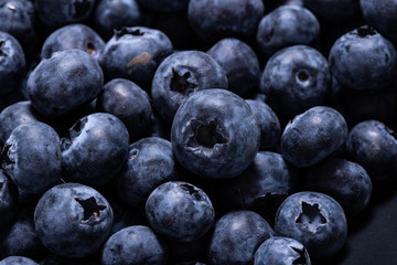 Fresh blueberries textured background, macro