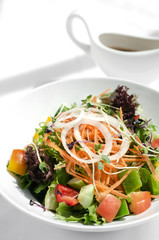fresh organic mixed vegetable vegan Garden Salad with Vinaigrette sauce