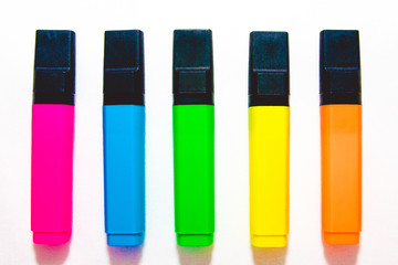 Colorful markers on white background, a lot of colored markers on white background, photo of markers for drawing different colors. 