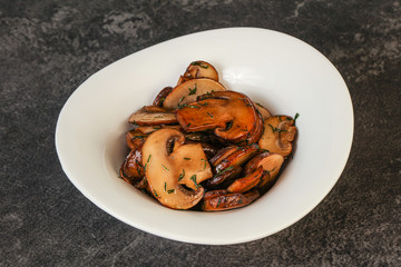 Roasted champignon with herbs and spices