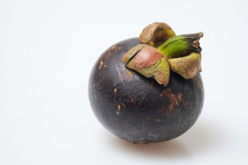 Close-Up Of Mangosteen Fruits On Table