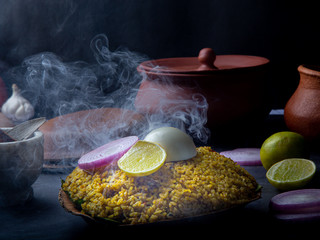 Biryani (Donne Biryani):  One of the variety of Biryani served in Donne(Leaf plate). The biryanis have gone through various customization and adaption to the local ingredients and needs .