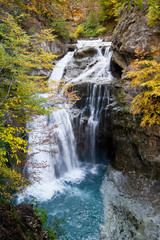 Waterfall in autumn forest