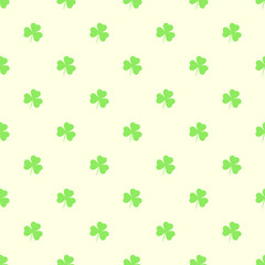 Seamless pattern with green clover leaves. Modern background with repeating elements for packaging, printing, fabric. Vector