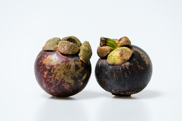 Close-Up Of Mangosteen Fruits On Table