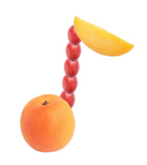 Musical note made of fruits on white background