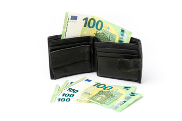 black leather men's wallet and several banknotes of 100 euros on a white background