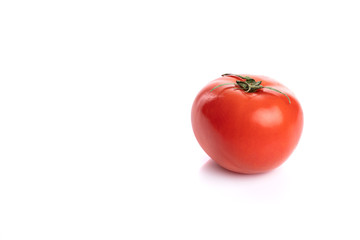 Red tomato isolated over white background, organic and frersh food concept