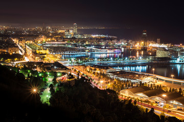 Fototapeta premium The city of Barcelona illuminated at night, Spain