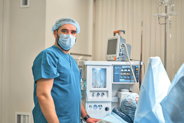 doctor performs plastic surgery