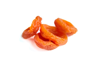 Dried apricot fruits isolated on white background