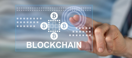 Man touching a blockchain concept