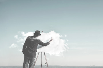 surreal man painting cloud on canvas, creativity concept