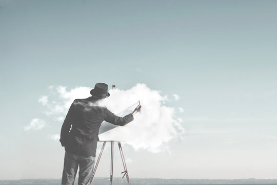 surreal man painting cloud on canvas, creativity concept