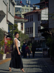 Woman standing on the street