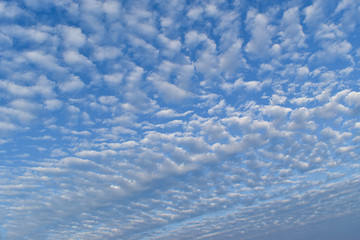 Fototapeta premium Blue sky background with clouds. Nature abstract composition