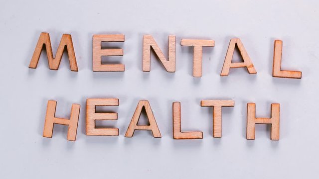 Mental Helth. The word is made in moving letters. Mental health relaxation in self-isolation.