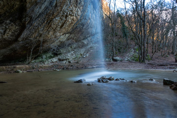 Fototapeta na wymiar Waterfall Visor in Crimea in winter, waterfall, beautiful waterfall Visor in the Baydar valley of Crimea