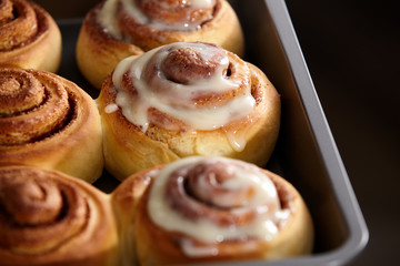 Fresh bakery. Cinnamon rolls are oiled.