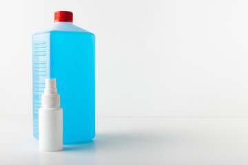 Bottle of antiseptic. Antibacterial spray for hands. Plastic bottle of sanitizer with clear body.