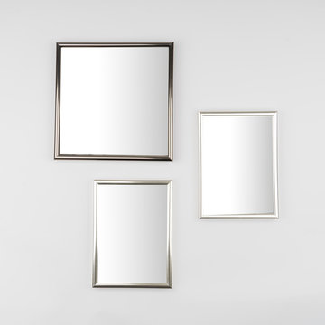 3 plain frames for photos on a wall