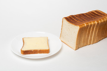 slice of wheaten bread spreaded with butter