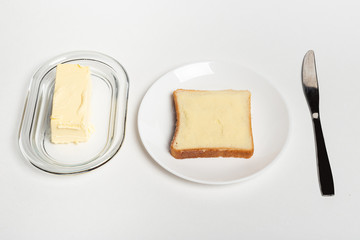 slice of wheaten bread spreaded with butter