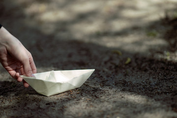 paper boat female hand