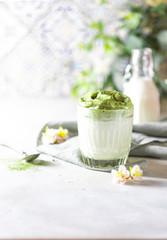 Obraz na płótnie Canvas Match Dalgona Latte, Match cream, on a white background. Matcha green tea.