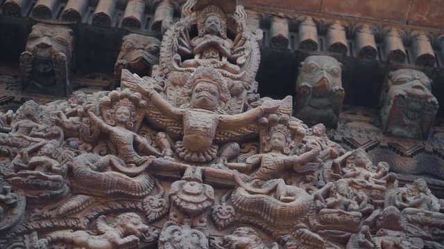 Ancient Newar Architectural Design And Intricate Carvings On Temples Of Patan Durbar Square In Nepal - panning shot