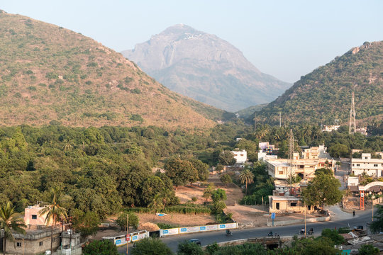 A view of the Girnar hills towering over the outskirts of the city of Junagadh from the Uparkot Fort.