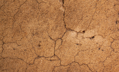 concrete wall with small cracks close up
