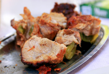 Grilled meat prepared in a traditional greek dish